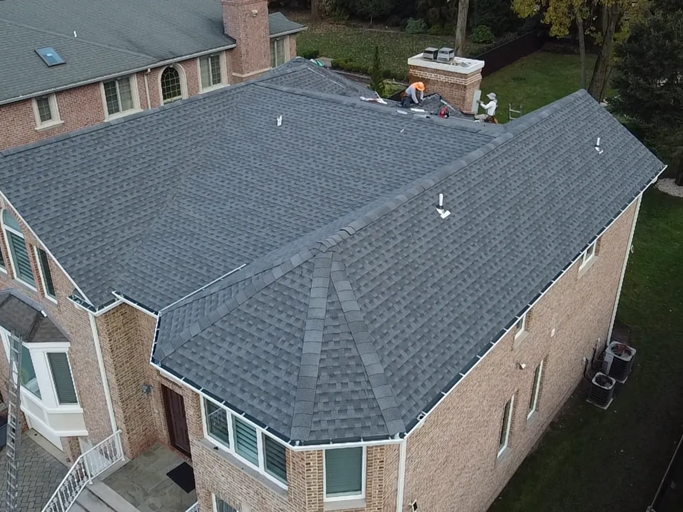 The same roof finished in architectural shingle by Skyline Construction Group