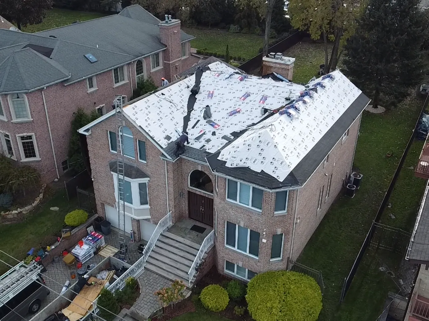 The roof stripped back to the underlayment before Skyline Construction Group reshingled it