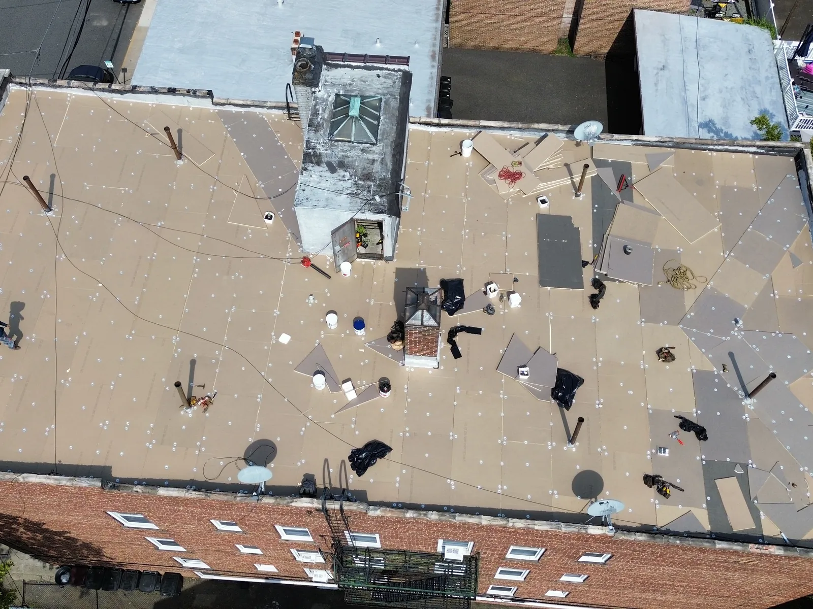 Flat roof from the air, commercial by Skyline Construction Group