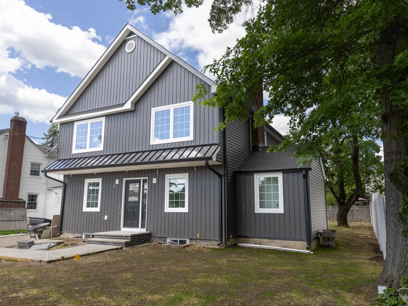 Board and batten elevation, siding by Skyline Construction Group