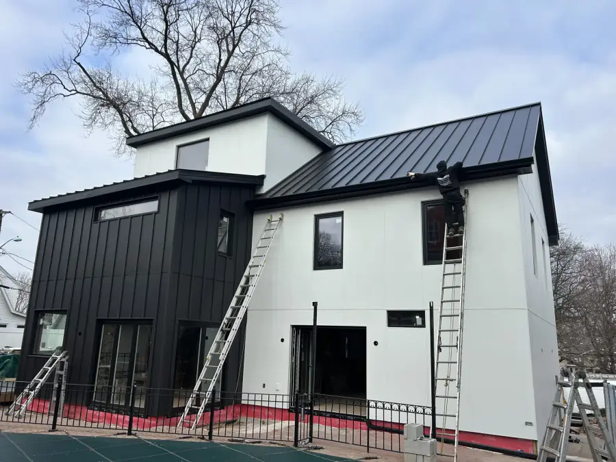 Black and white modern build, exterior by Skyline Construction Group